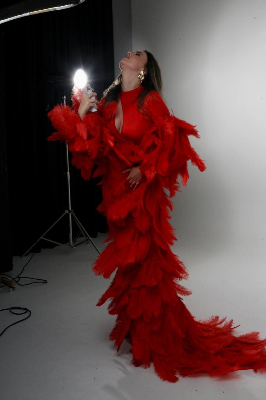 Red ostrich feather cape